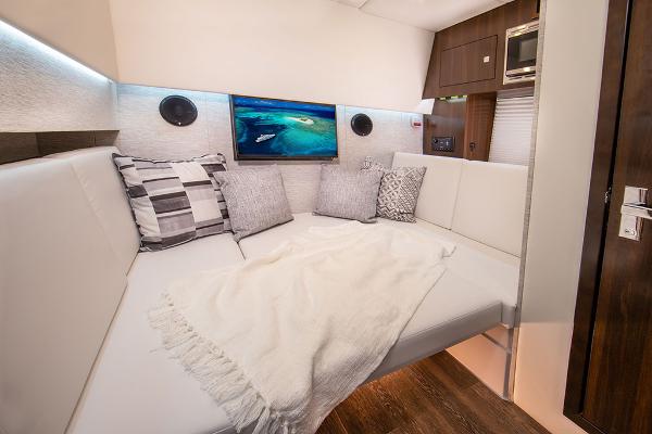 Slide: The Image of Luxurious interior of 2023 Cruisers Yachts 34 GLS with cozy seating and modern decor. - 49