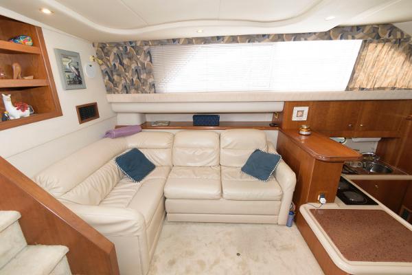 Slide: The Image of Luxurious interior of 1999 Cruisers Yachts 3750 Motoryacht with plush seating and elegant decor. - 18