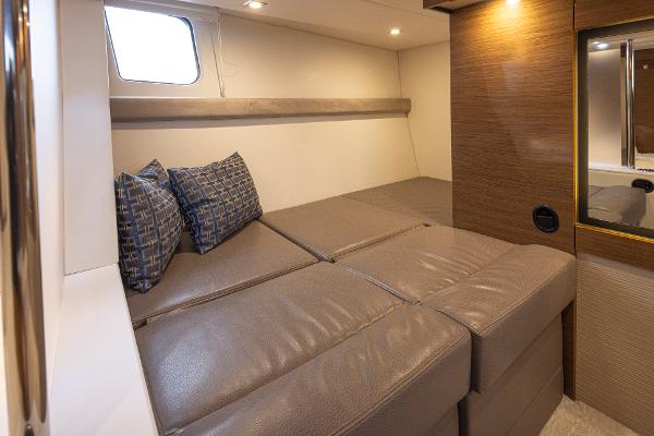 Slide: The Image of 2018 Cruisers Yachts 45 Cantius interior cabin with bed and pillows. - 20