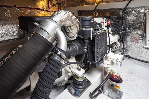 Slide: The Image of Engine room of a 2018 Cruisers Yachts 45 Cantius with Volvo Penta components. - 32
