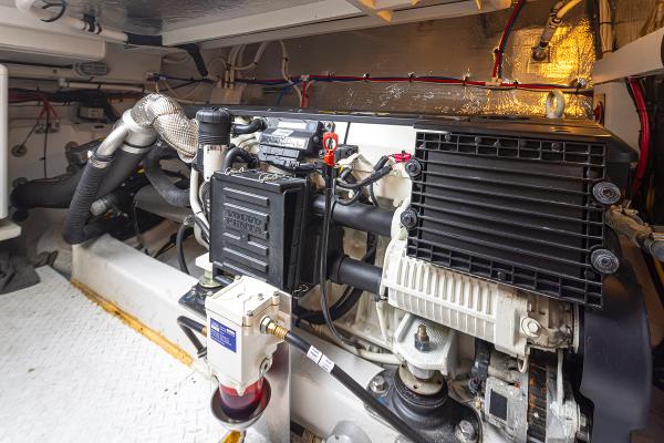 Slide: The Image of Engine room of a 2018 Cruisers Yachts 45 Cantius, showcasing mechanical components. - 37