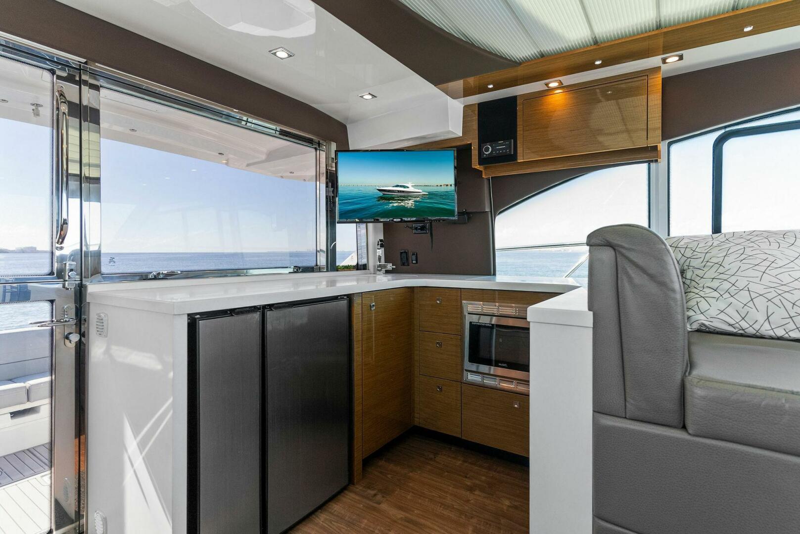 Slide: The Image of 2018 Cruisers 45 Cantius 'Royal Speerit III' Salon / Galley - 4007863