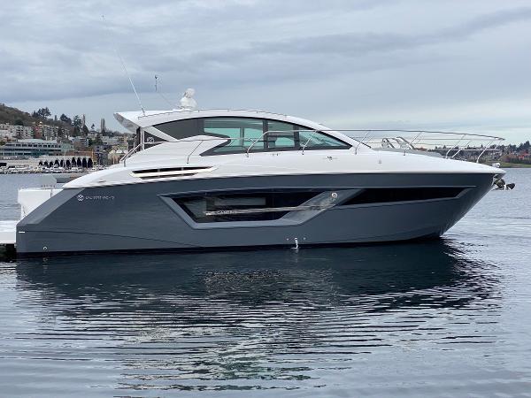 Slide: The Image of 2023 Cruisers Yachts 46 Cantius luxury boat on calm water, side view. - 6