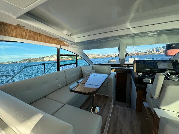 Slide: The Image of Interior of 2024 Cruisers Yachts 50 Cantius with waterfront view. - 15