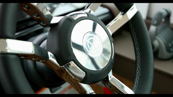 Slide: The Image of Close-up of the 2024 Cruisers Yachts 50 Cantius steering wheel. - 36