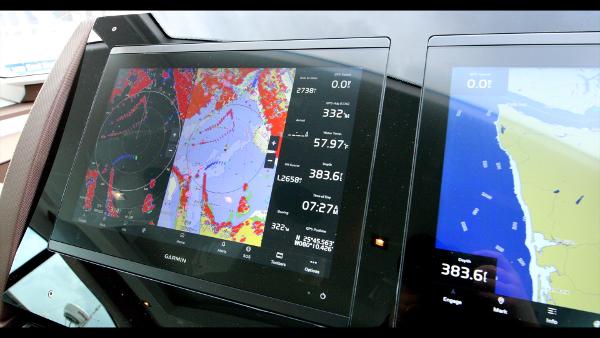Slide: The Image of 2024 Cruisers Yachts 50 Cantius navigation display showing detailed marine charts and data. - 39