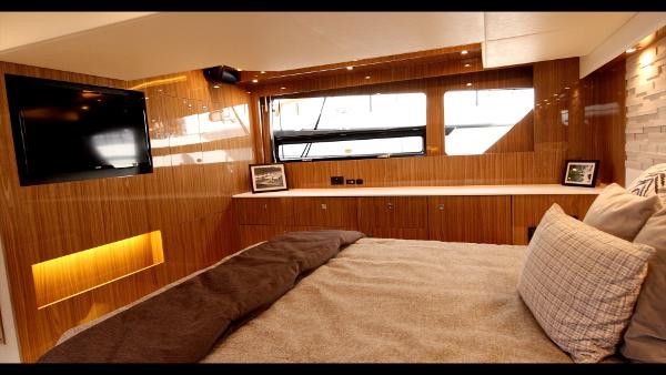Slide: The Image of Luxurious bedroom interior of 2024 Cruisers Yachts 50 Cantius with modern amenities. - 45
