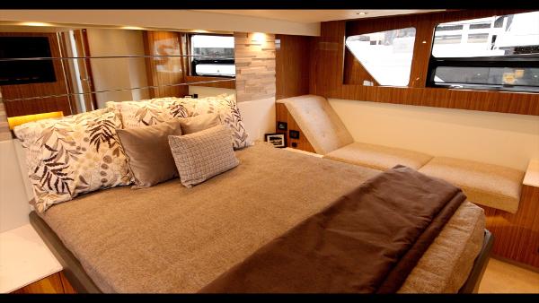 Slide: The Image of Luxurious bedroom interior of 2024 Cruisers Yachts 50 Cantius with modern decor and large windows. - 47