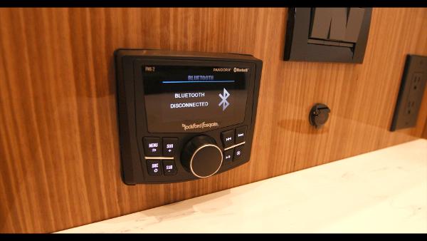 Slide: The Image of Rockford Fosgate Bluetooth stereo system in 2024 Cruisers Yachts 50 Cantius. - 48