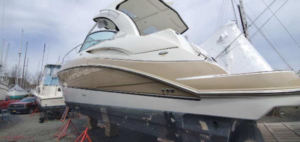 Slide: The Image of 2008 Cruisers Yachts Express boat on dry dock for maintenance. - 1