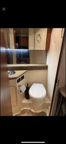 Slide: The Image of 2008 Cruisers Yachts Express bathroom with modern fixtures and compact design. - 15