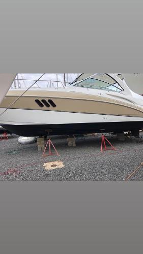 Slide: The Image of 2008 Cruisers Yachts Express on dry dock for maintenance. - 3