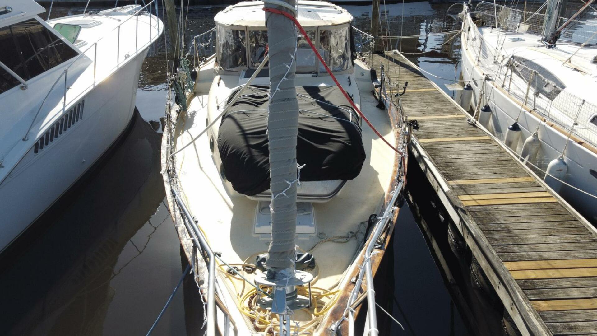 Slide: The Image of View from the Bow Good view of dinghy, enclosed cockpit, and 130 Genoa. - 2