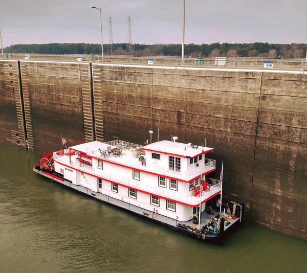 Slide: The Image of 1936 Custom Dravo Sternwheeler in a lock chamber on a river. - 1