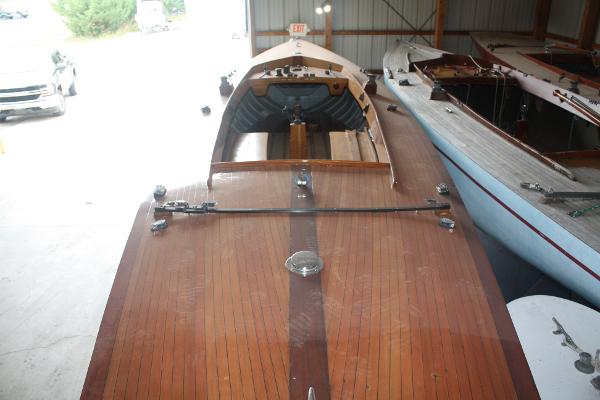 Slide: The Image of 1934 Custom Northern Michigan NM wooden boat in storage. - 14