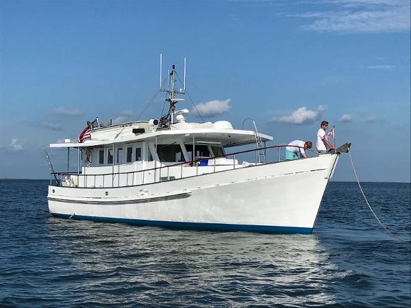 Slide: The Image of Custom 1987 Trawler Biloxi Lugger on calm sea with clear blue sky. - 1
