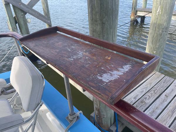 Slide: The Image of Wooden deck area on 1987 Custom Trawler Biloxi Lugger, docked by wooden posts. - 20