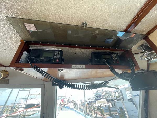 Slide: The Image of Control panel of 1987 Custom Trawler Biloxi Lugger with communication radios. - 29