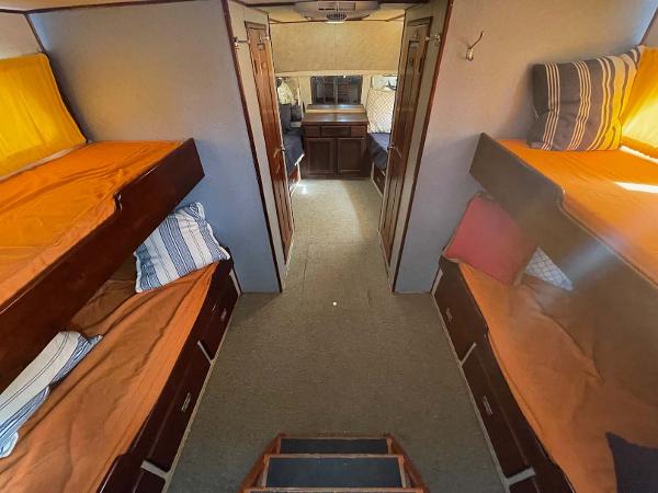 Slide: The Image of Interior of 1987 Custom Trawler Biloxi Lugger with bunk beds and cozy cabin layout. - 43