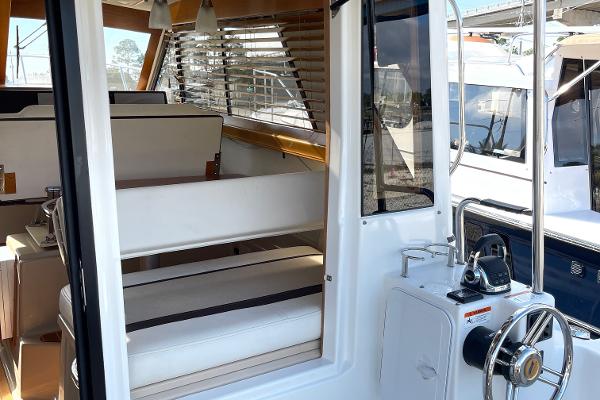 Slide: The Image of Interior view of 2016 Cutwater 30 Sedan LE boat with seating and helm. - 12