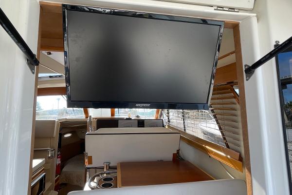 Slide: The Image of Interior of 2016 Cutwater 30 Sedan LE with mounted flat-screen TV. - 14