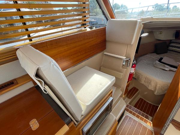 Slide: The Image of Interior of 2016 Cutwater 30 Sedan LE, featuring seating and cabin area. - 22