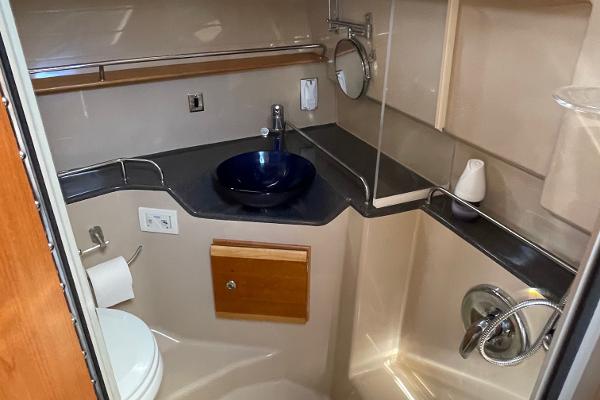 Slide: The Image of 2016 Cutwater 30 Sedan LE bathroom with modern sink and fixtures. - 37