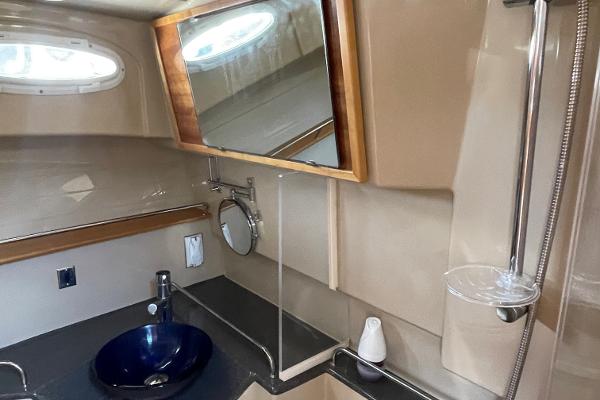 Slide: The Image of 2016 Cutwater 30 Sedan LE bathroom with modern sink and shower. - 39
