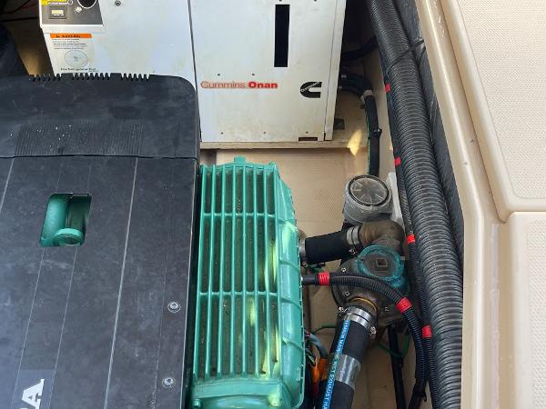 Slide: The Image of Engine compartment of 2016 Cutwater 30 Sedan LE with Cummins Onan generator. - 43