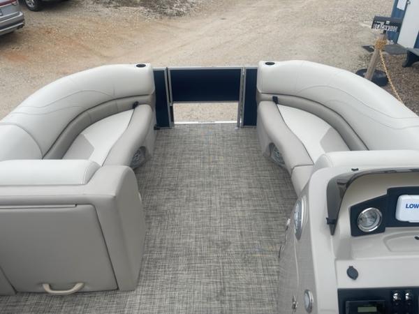 Slide: The Image of 2023 Cypress Cay Seabreeze 212 pontoon boat interior with beige seating. - 12