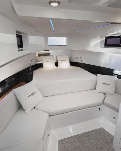 Slide: The Image of Luxurious interior of 2024 De Antonio Yachts D36 OPEN with modern design and comfortable seating. - 12