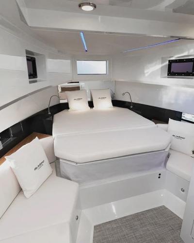 Slide: The Image of 2024 De Antonio Yachts D36 OPEN cabin interior with modern design and comfortable bedding. - 13
