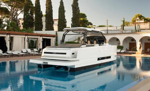 Slide: The Image of 2024 De Antonio Yachts D36 OPEN in luxurious poolside setting. - 6