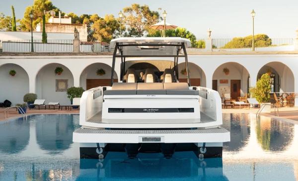 Slide: The Image of 2024 De Antonio Yachts D36 OPEN in a luxurious pool setting. - 7