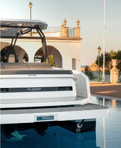 Slide: The Image of 2024 De Antonio Yachts D36 OPEN in marina, showcasing sleek design and modern architecture. - 8