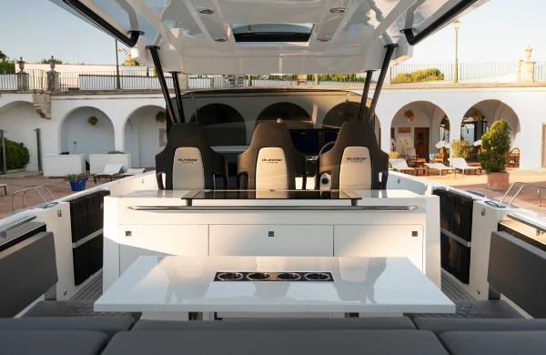 Slide: The Image of 2024 De Antonio Yachts D36 OPEN interior with sleek seating and modern design. - 9