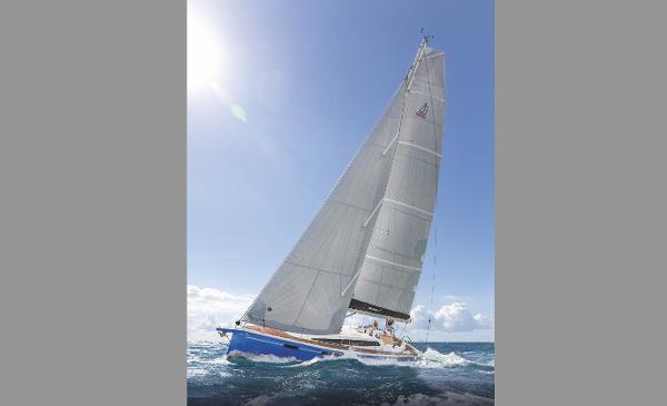 Slide: The Image of 2025 Dehler 38 SQ sailing yacht on open water under clear skies. - 30