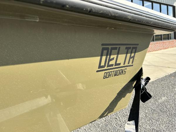 Slide: The Image of 2024 Delta Boatworks Delta 18 boat exterior with logo. - 17