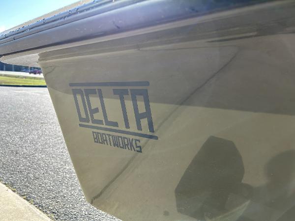 Slide: The Image of Delta Boatworks Delta 18 2024 model boat exterior with logo - 19