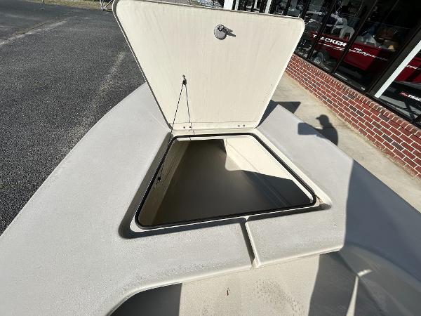 Slide: The Image of Open storage compartment on 2024 Delta Boatworks Delta 18 boat. - 20