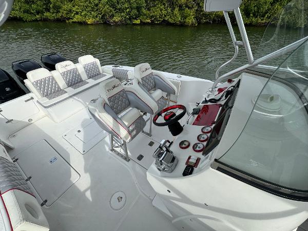 Slide: The Image of 2008 Donzi 38 ZSF boat interior with helm and seating. - 13