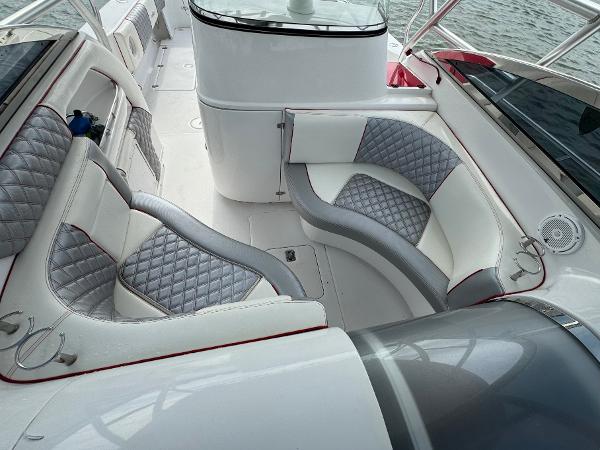 Slide: The Image of 2008 Donzi 38 ZSF boat interior with gray and white seating. - 22