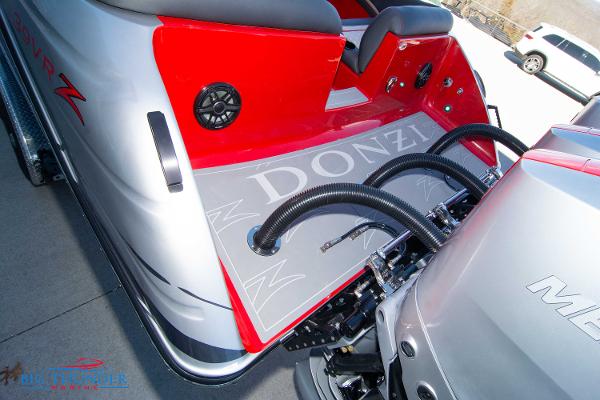 Slide: The Image of 2024 Donzi 39 VRZ boat stern with engine and seating. - 35
