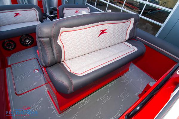 Slide: The Image of 2024 Donzi 39 VRZ boat interior with custom seating and red accents. - 46