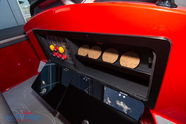Slide: The Image of Control panel and storage compartment of 2024 Donzi 39 VRZ boat. - 48
