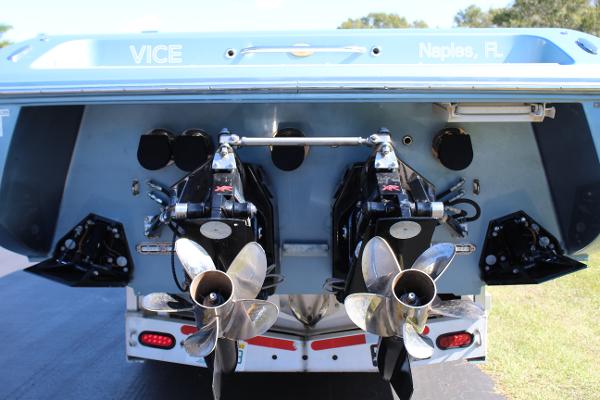 Slide: The Image of Rear view of a 2006 Donzi 43 ZR boat with dual propellers. - 10