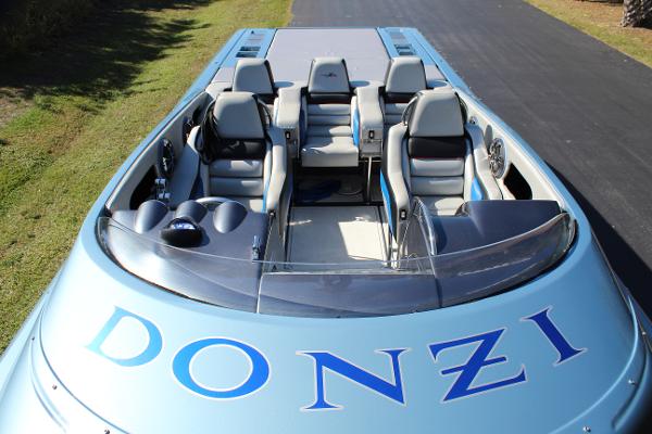Slide: The Image of 2006 Donzi 43 ZR speedboat with sleek design and spacious seating. - 17