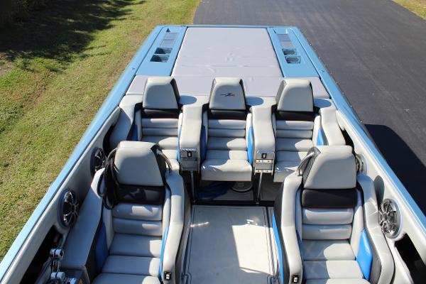 Slide: The Image of 2006 Donzi 43 ZR boat interior with gray and blue seating. - 19