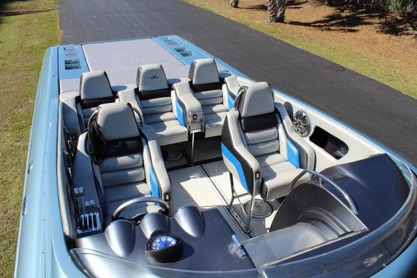 Slide: The Image of 2006 Donzi 43 ZR speedboat interior with blue and gray seating. - 21
