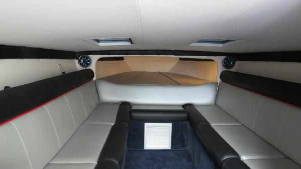 Slide: The Image of Interior cabin of a 2006 Donzi 43 ZR boat with seating and skylights. - 32